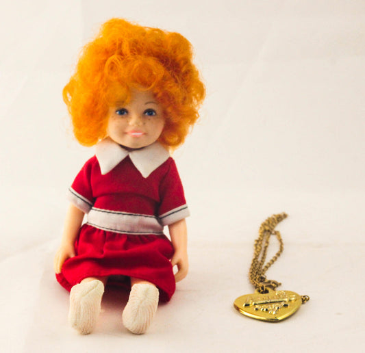 Vintage Doll with Red Dress and Heart-Shaped 'Annie'
