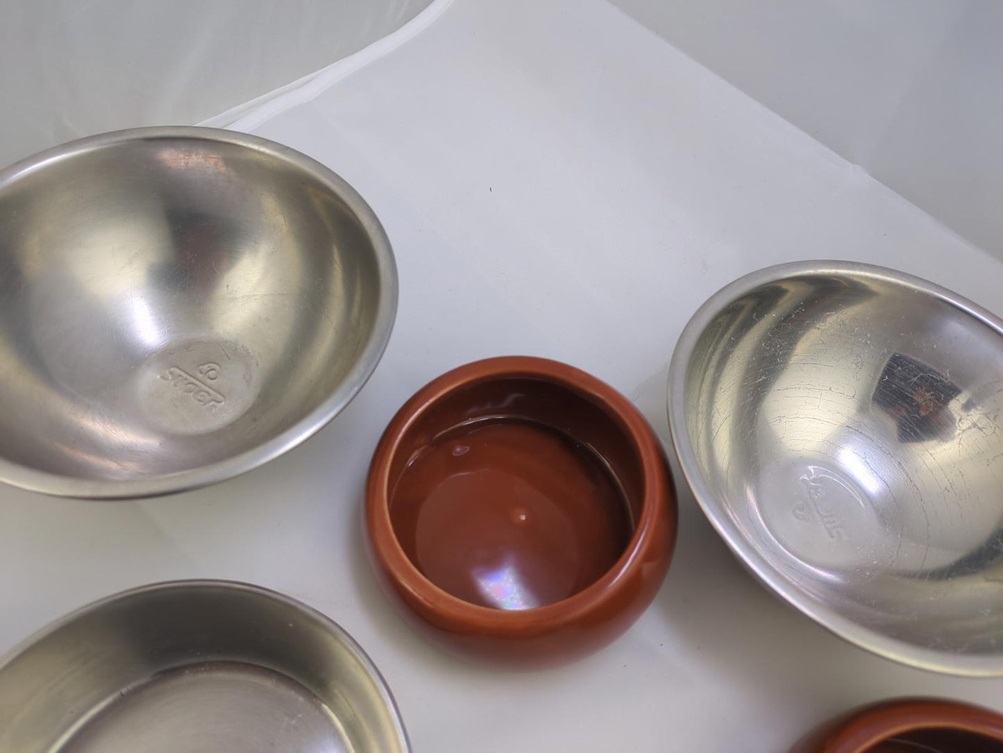 Set of 7 Stainless Steel and Clay Bowls