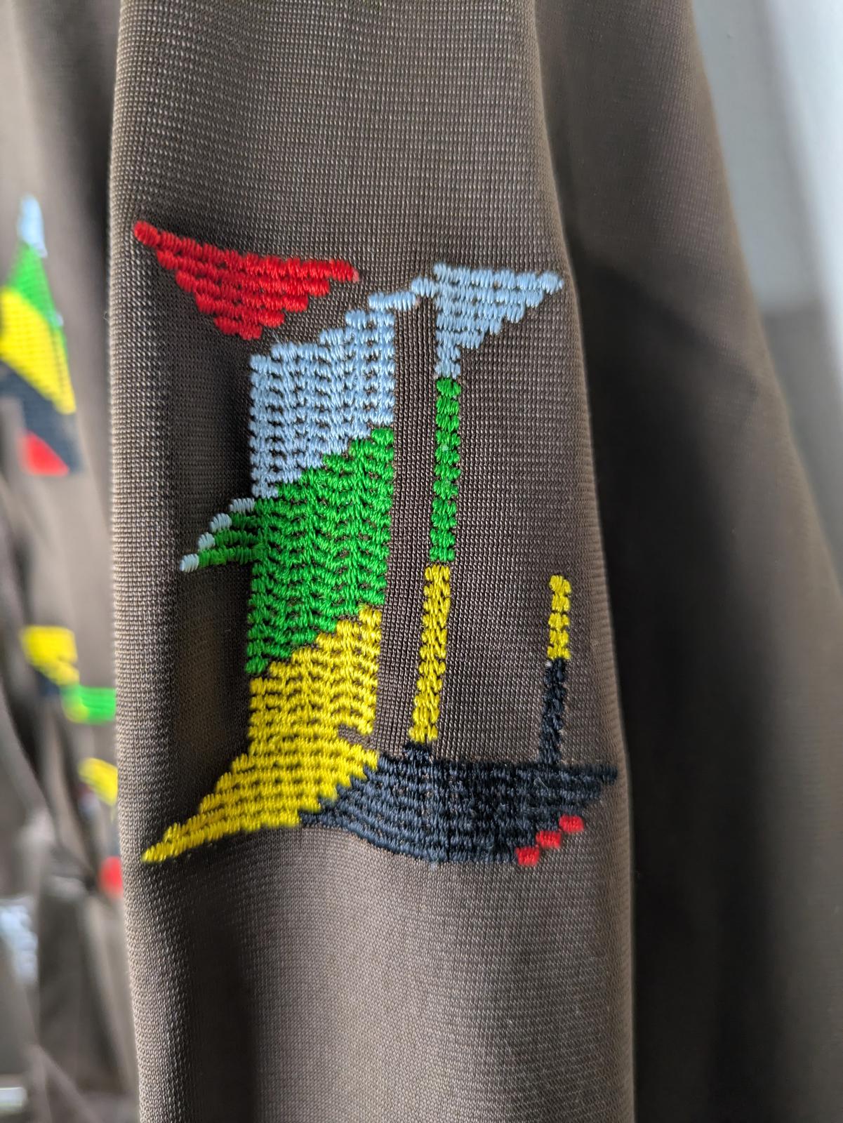 Roots - Vibrant Geometric Embroidered Hoodie - Your New Favorite Cozy Companion