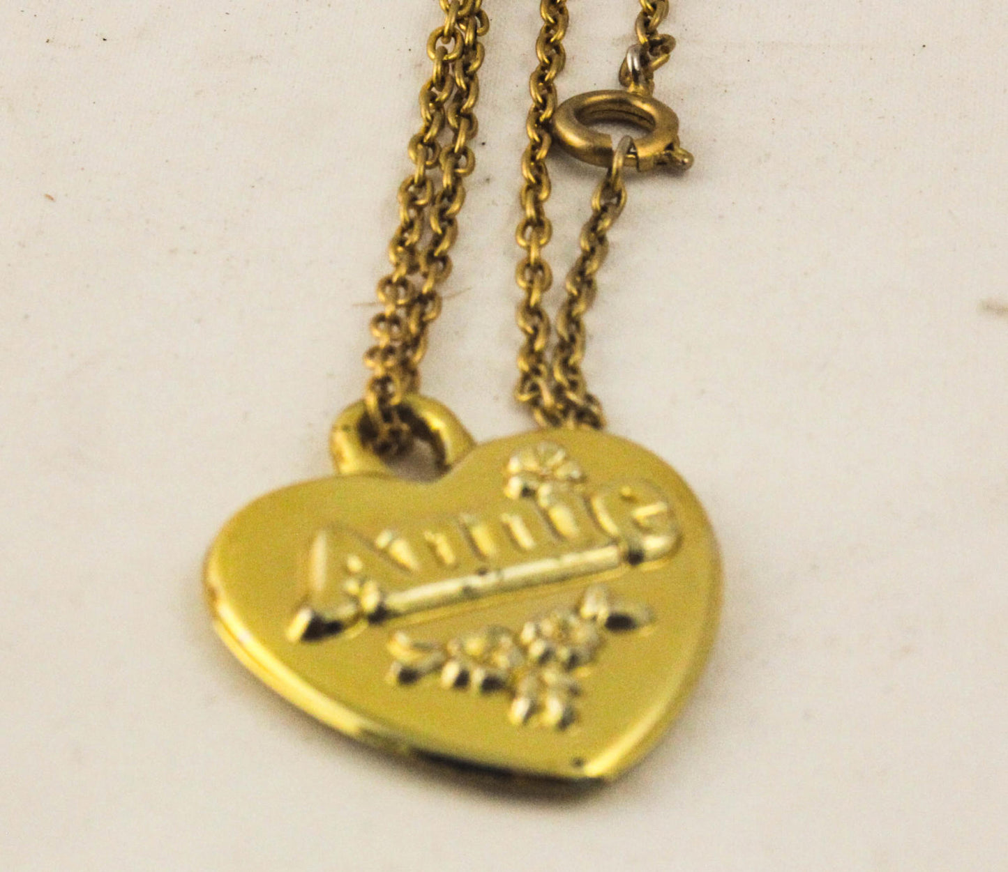 Vintage Doll with Red Dress and Heart-Shaped 'Annie'