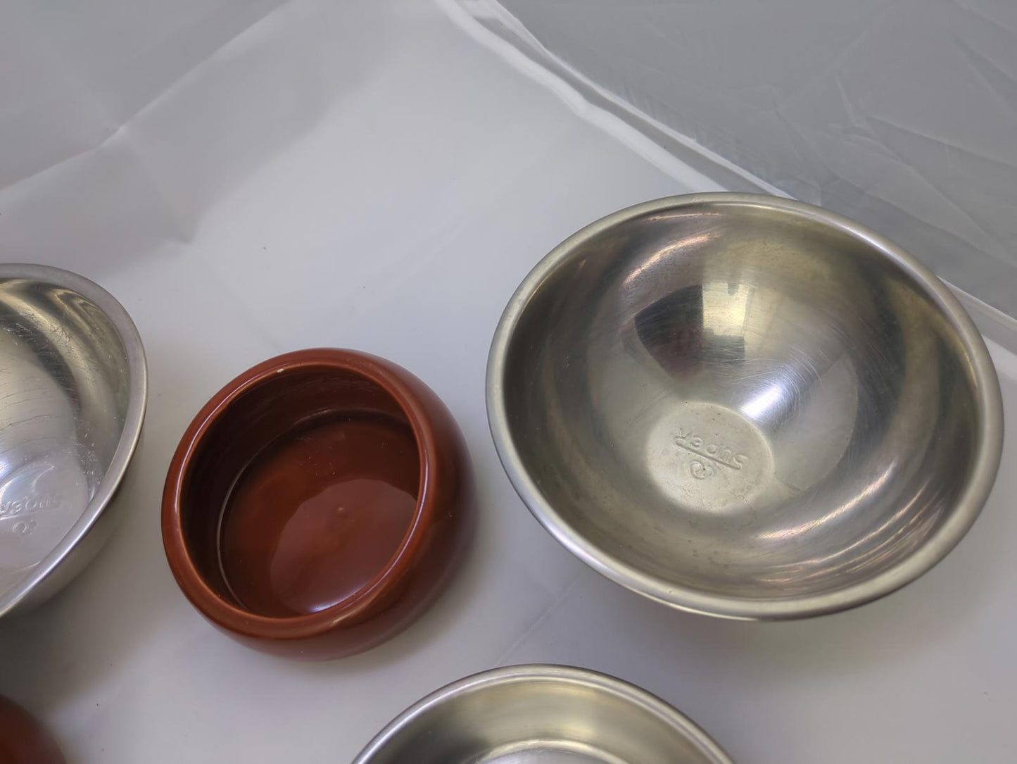 Set of 7 Stainless Steel and Clay Bowls