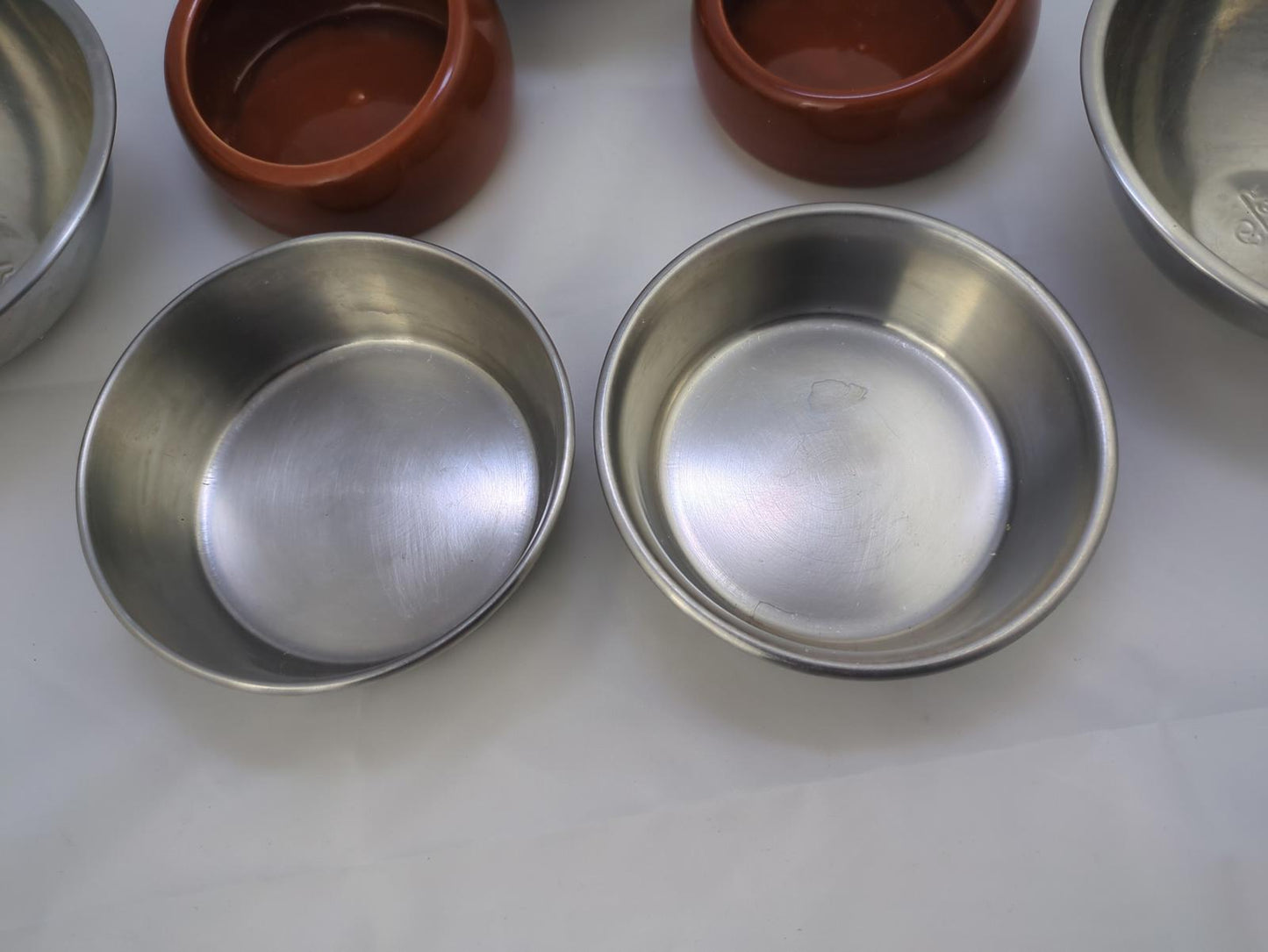 Set of 7 Stainless Steel and Clay Bowls