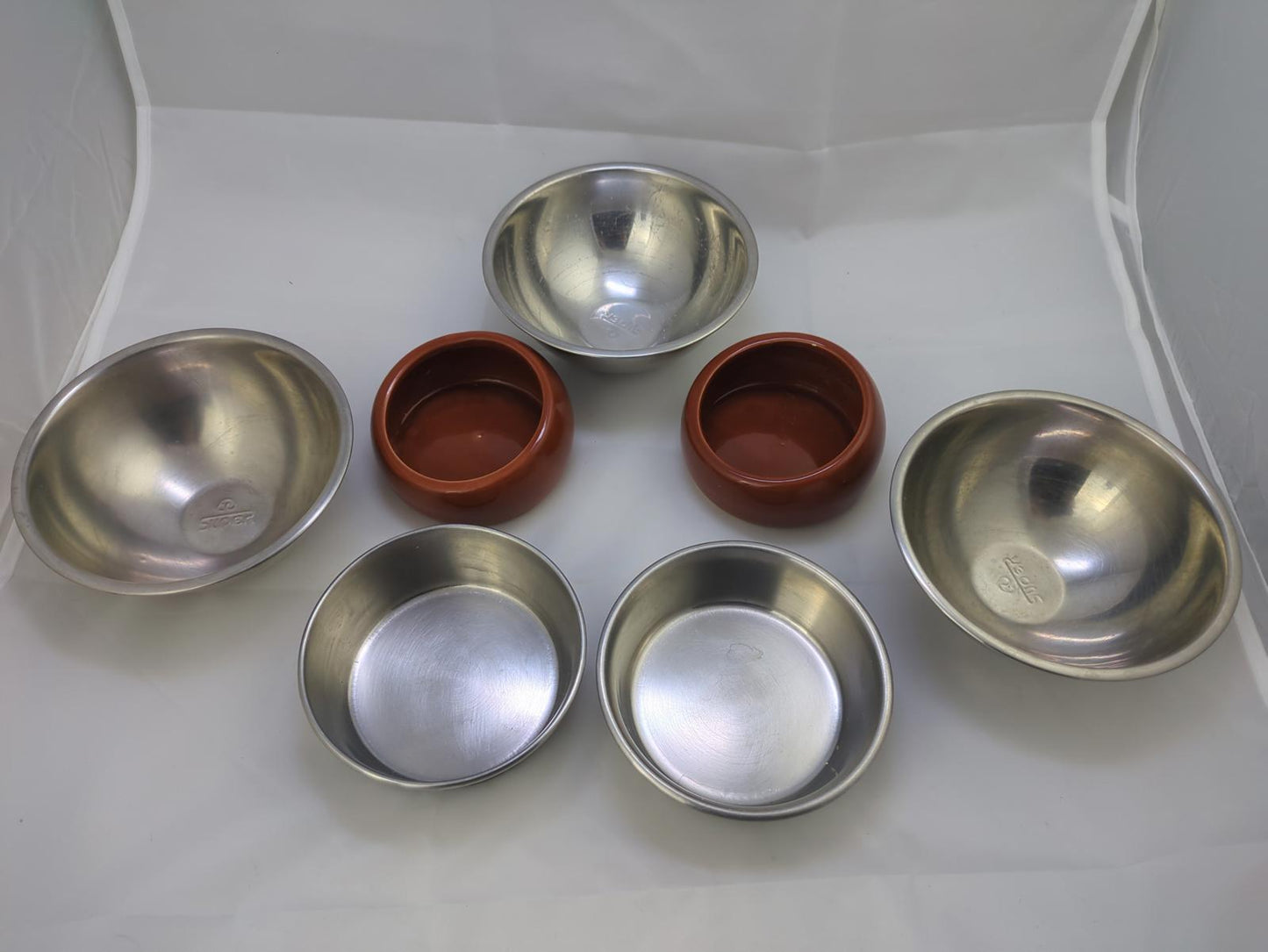 Set of 7 Stainless Steel and Clay Bowls